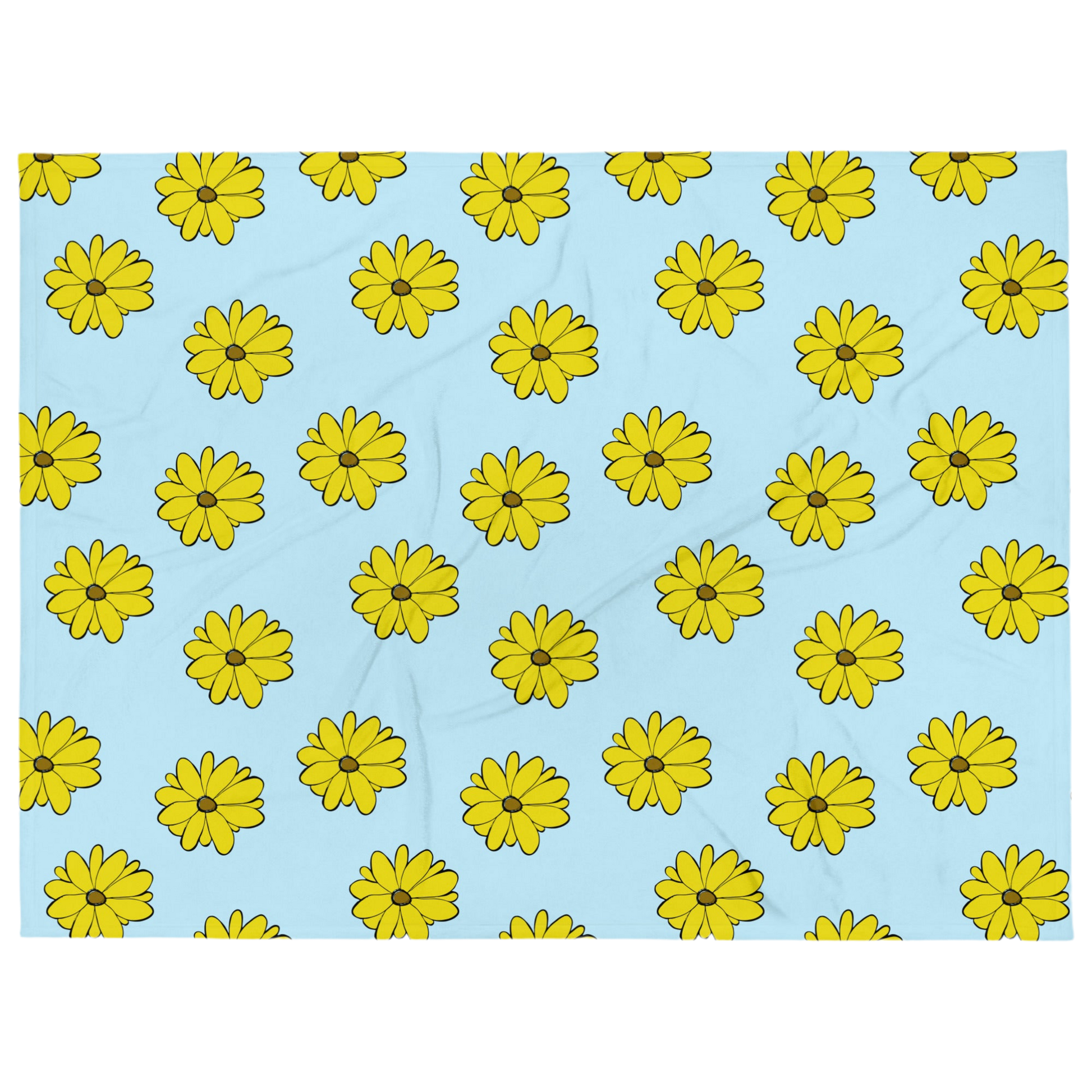 A photo of a blue blanket with a pattern of vibrant yellow sunflowers with brown centres.