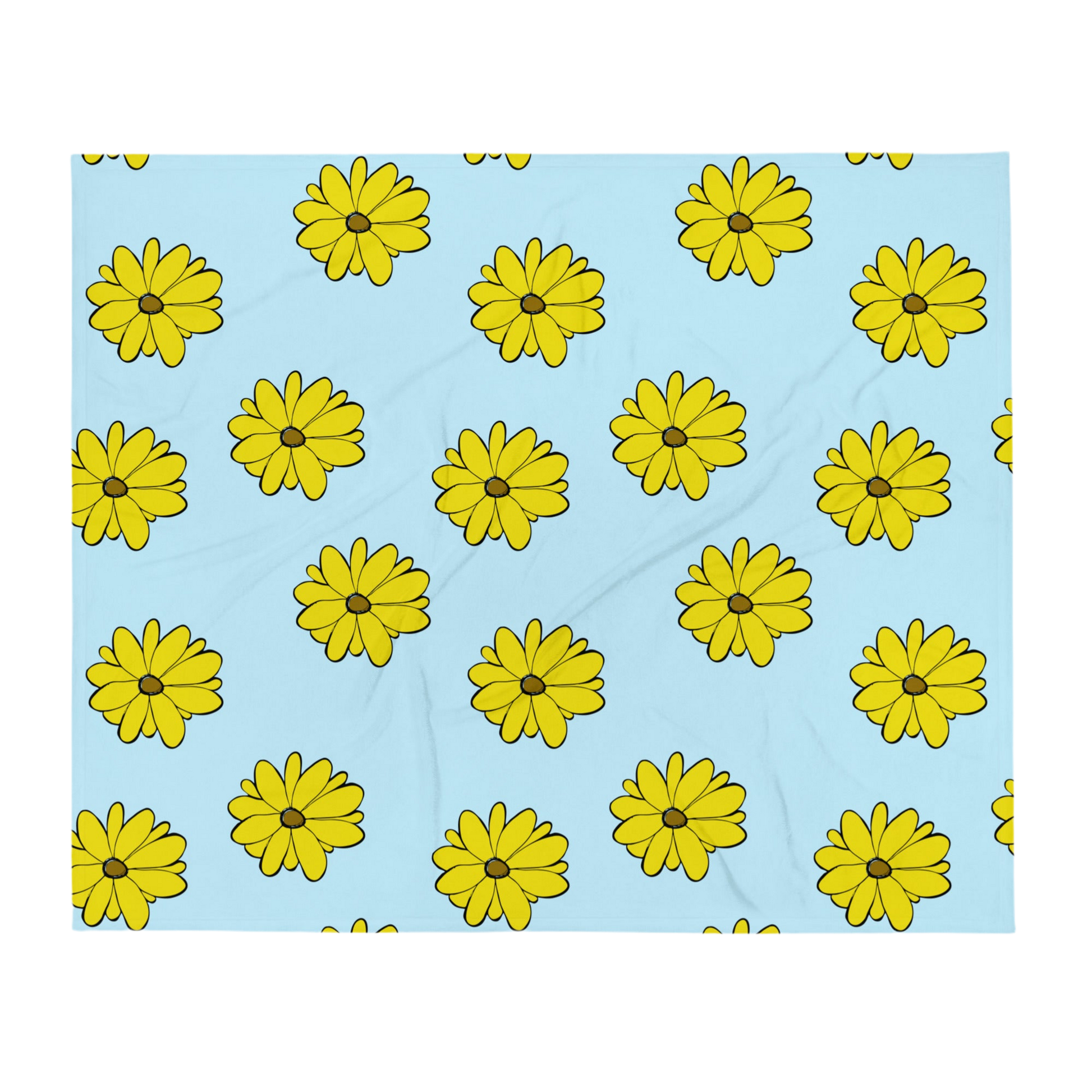 A photo of a blue blanket with a pattern of vibrant yellow sunflowers with brown centres.