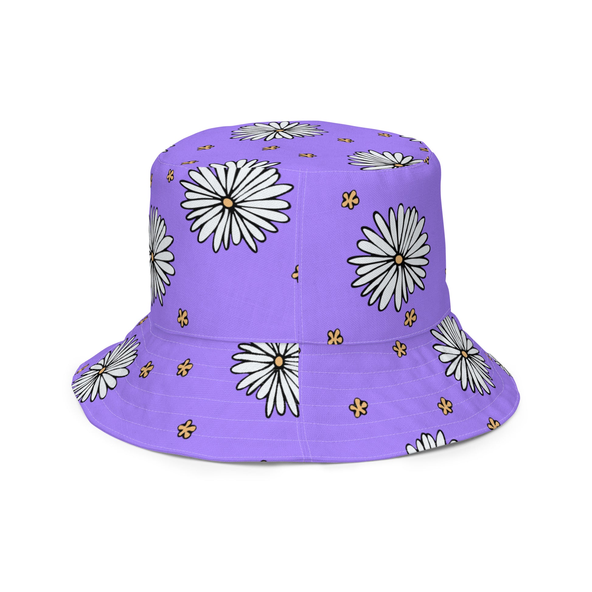 A photo of a vibrant purple bucket hat patterned with hand-drawn white daisies with yellow centres and miniature hand-drawn yellow flowers. 