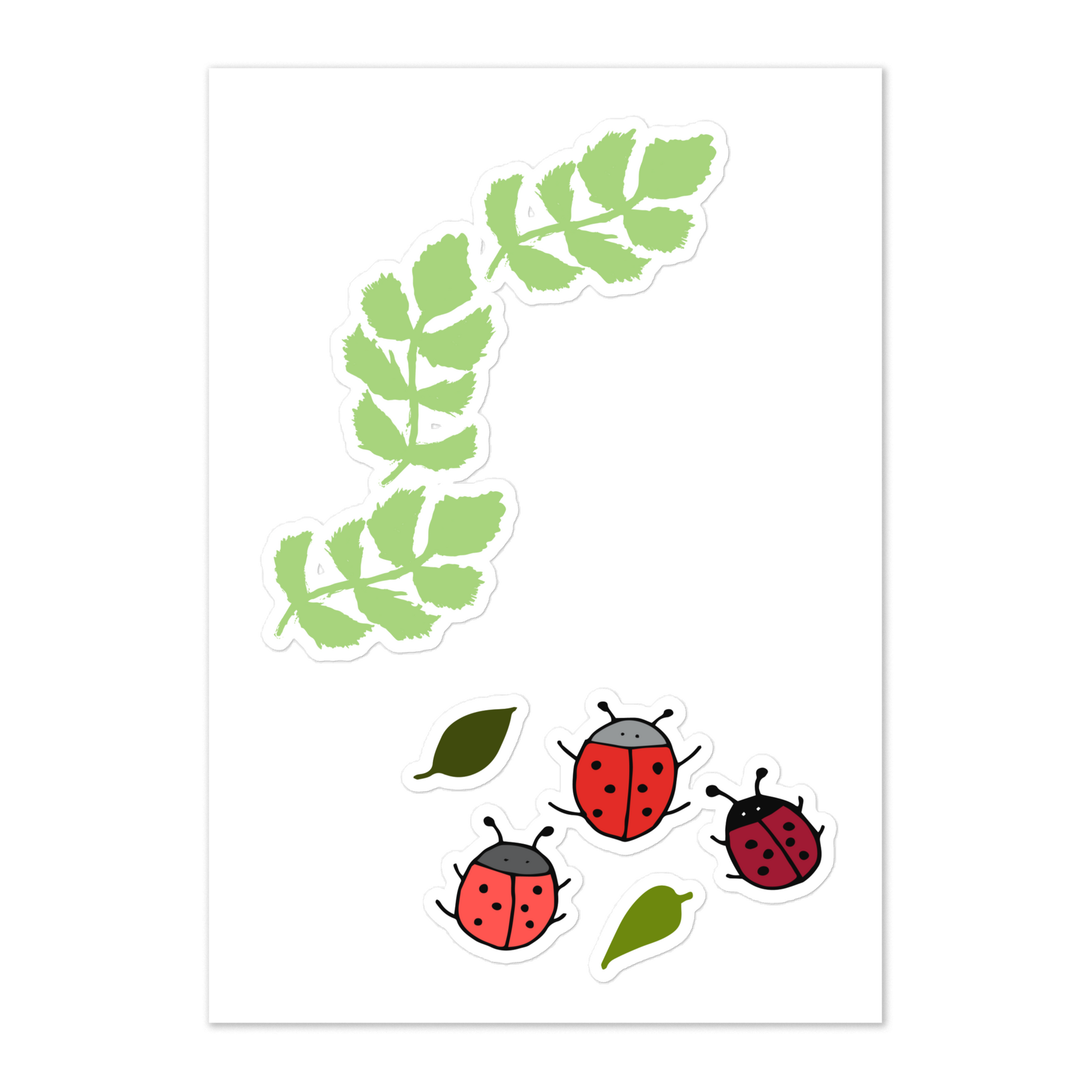 A sticker sheet showcasing a hand-painted green garland of leaves and hand-drawn ladybugs in shades of red with green leaves.