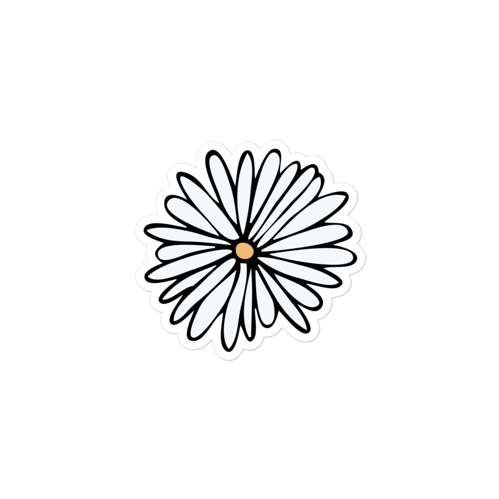 A photo of a hand-drawn white daisy sticker with a yellow centre. 